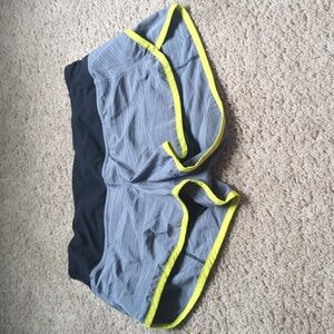 Lululemon gray black, yellow women's short size 4